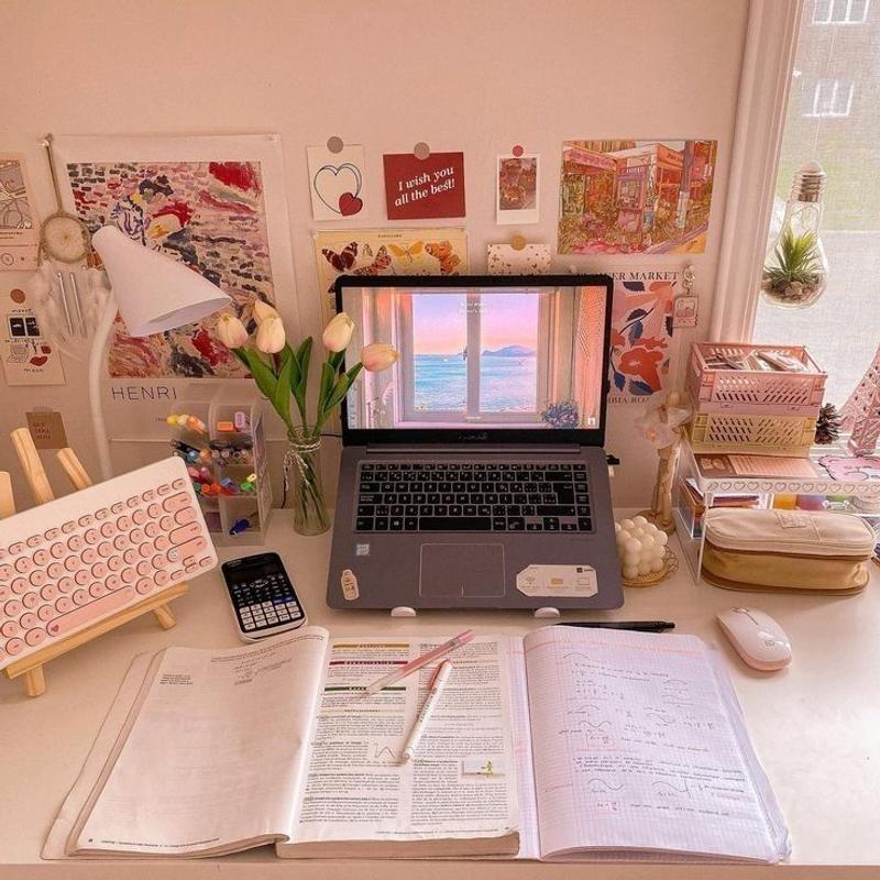 Pastel study desk with notebooks and stationery for exam preparation
